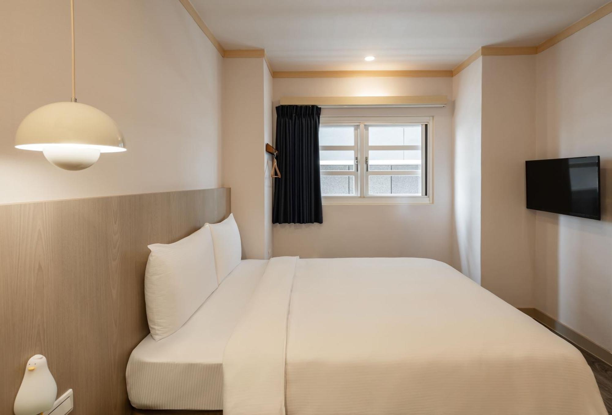 Kindness Hotel - Tainan Minsheng Habitación foto